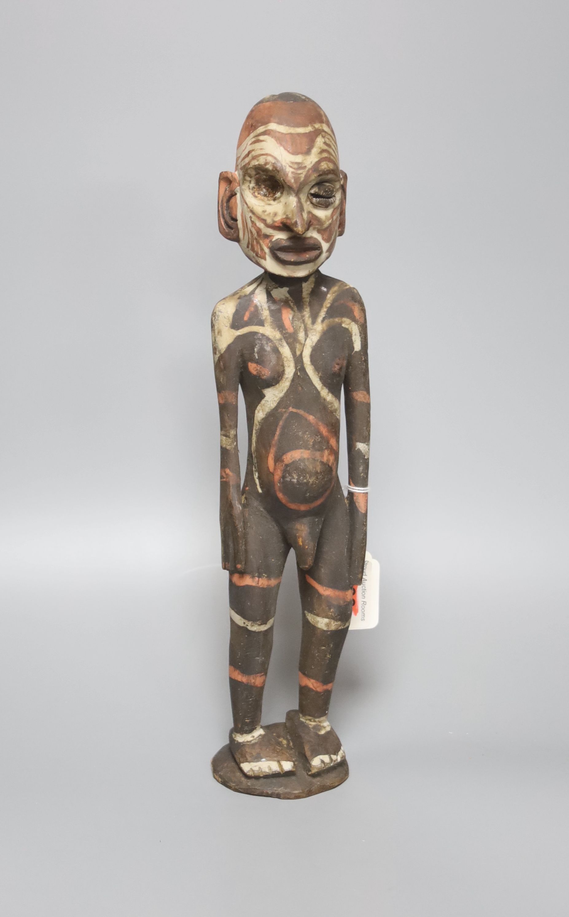 A Papua New Guinea wood figure, painted in coloured pigments, height 34cm - Image 2 of 2