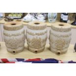 Three Doulton Lambeth spirit barrels, Rum, Gin and Brandy, height 32cm