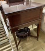 An Edwardian mahogany 'Surprise' drinks table by Maple & Co., width 58cm, depth 60cm, height 76cm
