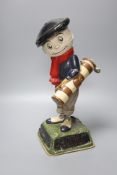 A composition advertising golfing figure 'We Play Dunlop', height 37cm