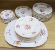 An English porcelain part dinner service, c.1825-30, and other similar plates