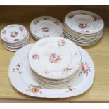 An English porcelain part dinner service, c.1825-30, and other similar plates