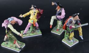 A set of four Continental porcelain Derby-style Comedia del Arte figures, largest 18.5cmCONDITION: -