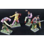 A set of four Continental porcelain Derby-style Comedia del Arte figures, largest 18.5cmCONDITION: -