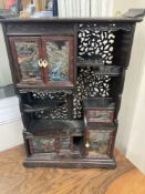 A 20th century Chinese carved cabinet with painted hinged cupboard doors, 79cm height, width 52cm,