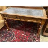 A Victorian mahogany two drawer writing table, with a leather inset top, width 114cm, depth 52cm,