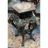 A late 19th/early 20th century Chinese carved jardiniere stand, 65cm. high