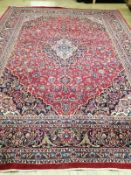A carpet (worn / damaged), 385 x 295cm