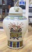 A large Chinese famille rose baluster vase and cover, height 78cmCONDITION: A 'W' shaped section