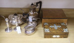 A Victorian studded box, a modern humidor, two candlesticks and a four piece silver plated tea set