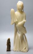 A large Chinese cream soapstone figure of an immortal, 41.5cm, (damaged) and a smaller 19th