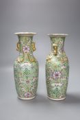 A pair of late 19th century Chinese famille rose vases, height 26cm