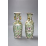 A pair of late 19th century Chinese famille rose vases, height 26cm