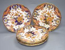 A set of six Royal Crown Derby dessert dishes, decorated in an Imari palette, diameter