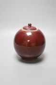 A Chinese sang de boeuf jar and cover, height 17cm