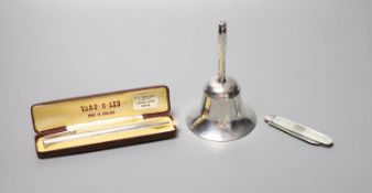 A silver handled bell, 11.5cm, a silver cased Yard-O-Led pen and a mother of pearl handled silver