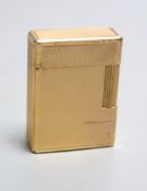 A vintage S.T. Dupont gold plated lighter