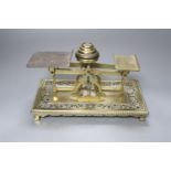 A set of Edwardian brass letter scales, width 22cm height 15cm