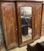 A large Victorian mahogany break front compactum three door wardrobe, length 230cm, depth 60cm,