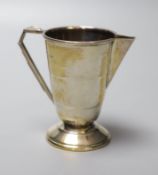 A George V Art Deco silver cream jug, Joseph Gloster Ltd, Birmingham, 1936, 10cm, 129 grams.