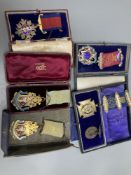 Five assorted early to mid 20th century silver gilt and enamel masonic jewels and a similar 1935