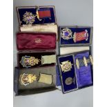 Five assorted early to mid 20th century silver gilt and enamel masonic jewels and a similar 1935