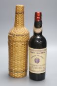 A bottle of Joao Pereira d'Oliveira Madeira 1930