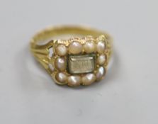 An early Victorian 18ct gold, split pearl and enamel(a.f.) mourning ring, with central glazed