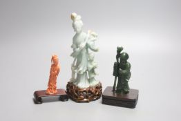 A Chinese coral figure of a lady, 9cm, a Chinese jadeite group of Guanyin with stand 19.5cm and a