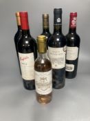 Five assorted red wines including Chateau Charon, 2002, Chateau de Pennautier, 2008, Penfold's Bin 2