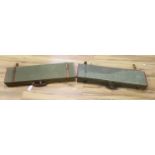 Two vintage green cloth and leather gun cases, length 72cm