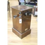 An early 20th century mahogany table top stereoscopic card viewer with monochrome Boer War cards,