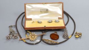 An Edwardian 15ct and gem set bar brooch, 45mm gross 3.4 grams, one other similar yellow metal and