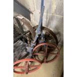 Four vintage cast iron wheels