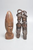 Three tribal carvings, tallest 21cm