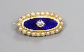 A Victorian yellow metal, blue enamel, seed pearl and diamond set oval brooch, 29mm, gross 6.8