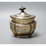 A late Victorian reeded silver oval tea caddy, William Aitken, Chester, 1899, gross 5 oz.