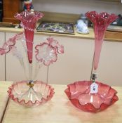 A Victorian cranberry glass four branch epergnes and a single glass epergne, tallest 47cm