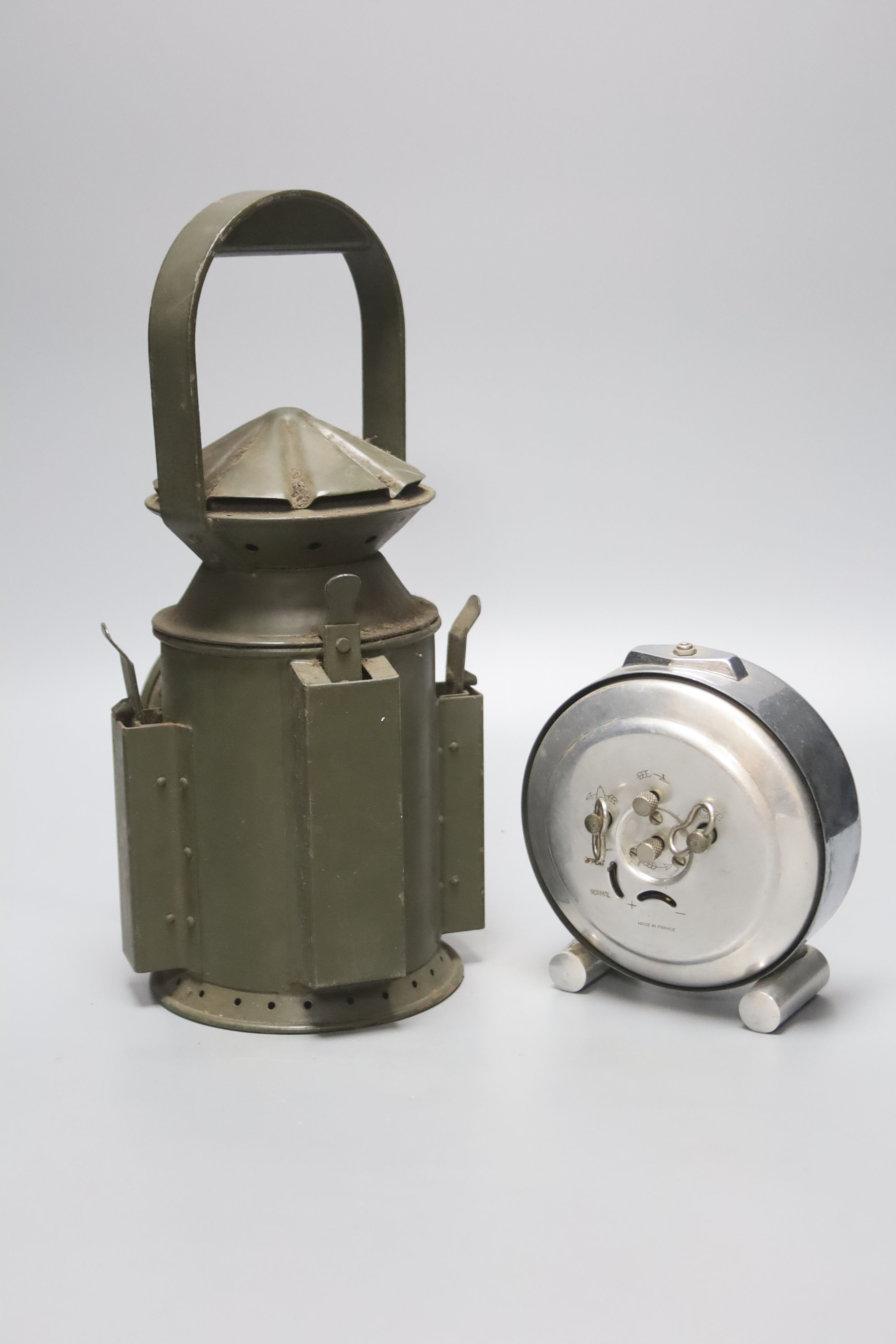 A green painted railway lantern, 30cm high, together with a French chrome cased alarm clock, the - Image 2 of 2