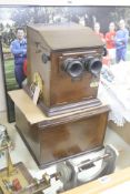 A late 19th century French mahogany cased stereoscopic Taxiphote viewer, together with a cabinet