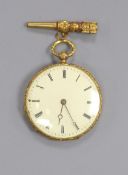 An early 20th century Swiss yellow metal open face fob watch and key, case diameter 27mm, gross 13.7