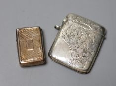An early Victorian silver vinaigrette, Birmingham, 1838, 32mm and a silver vesta case.CONDITION: