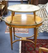 A late 19th century French satinwood, rosewood crossbanded and gilt metal mounted two tier oval