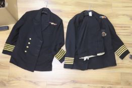 Two Royal Navy Captain's jackets and associated trousers