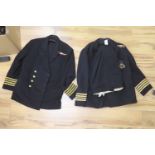 Two Royal Navy Captain's jackets and associated trousers