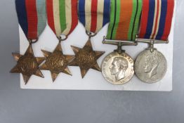 WWII medal group comprising 1939-1945 Star, the Italy Star, the France and Germany Star, Victory