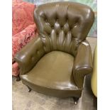 A Victorian library chair upholstered in olive green leather, width 80cm, depth 70cm, height 86cm