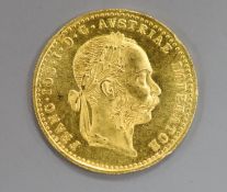 A 1915 gold one ducats coin.