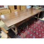 An 18th century style oak rectangular refectory dining table, length 277cm, width 109cm, height