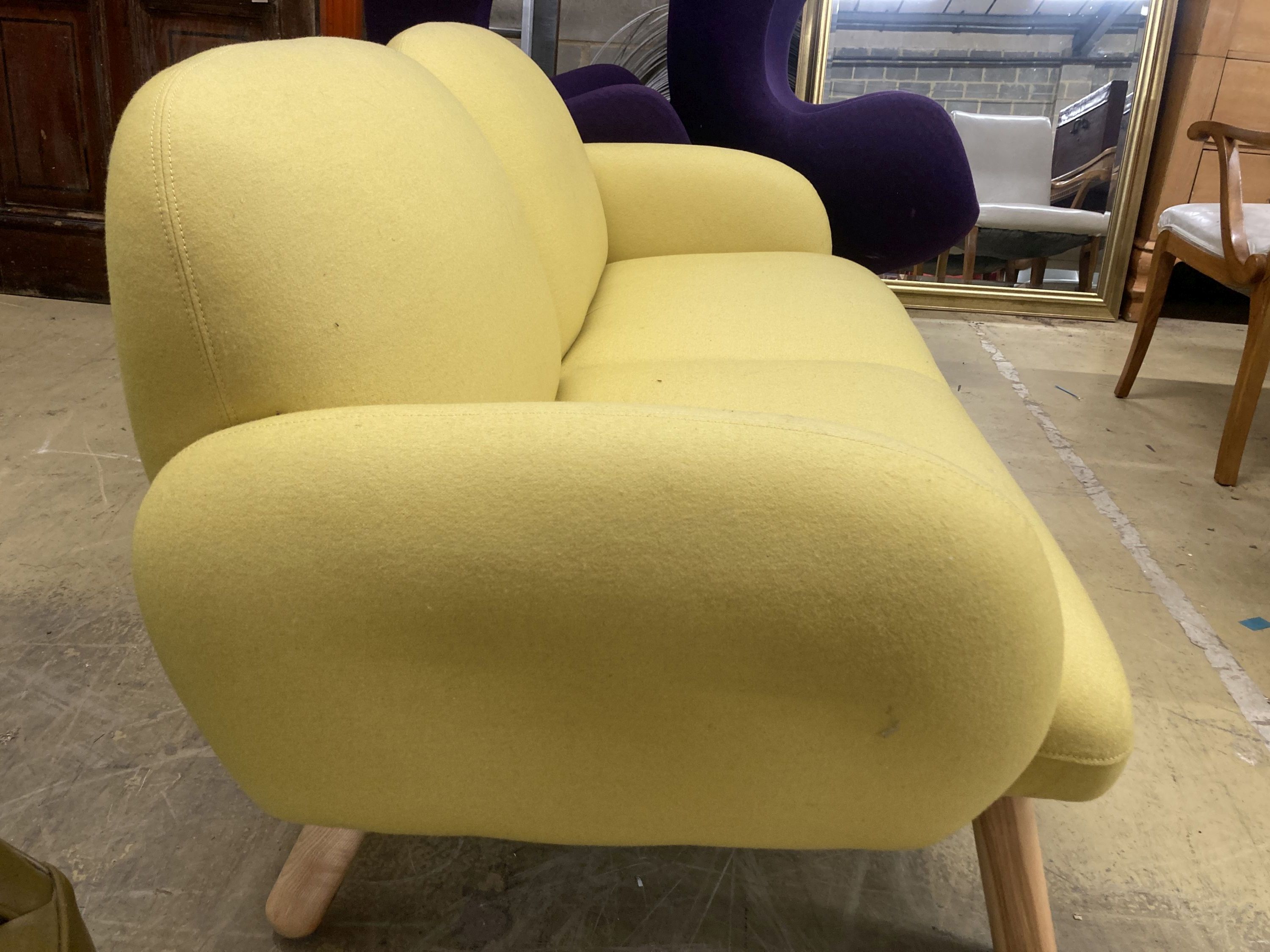 A contemporary pale yellow fabric two seater settee, length 160cm, depth 80cm, height 76cm - Image 3 of 4